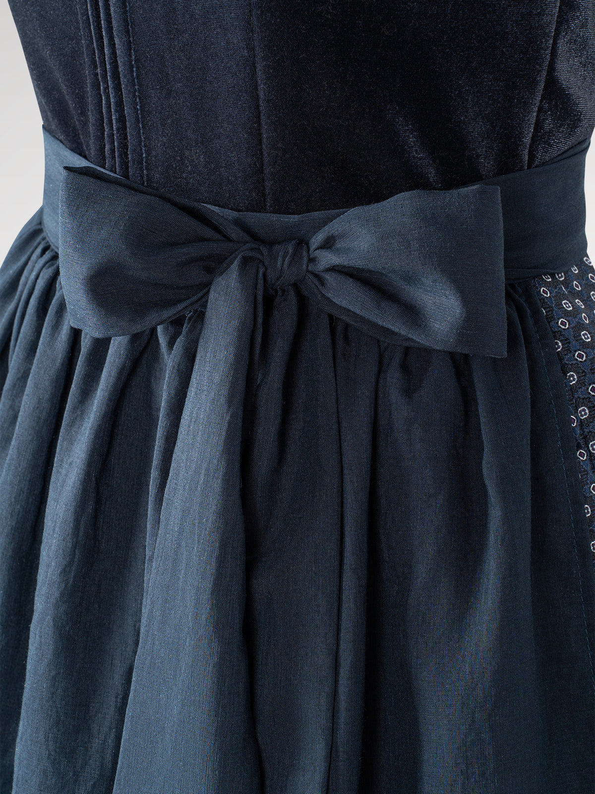 Women blue zipper in front of structured dirndl